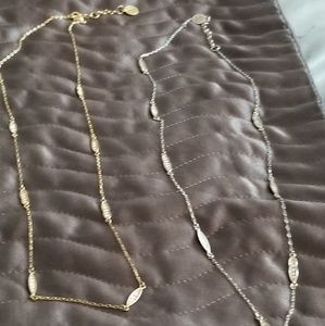 Jessica Simpson long gold and silver necklaces